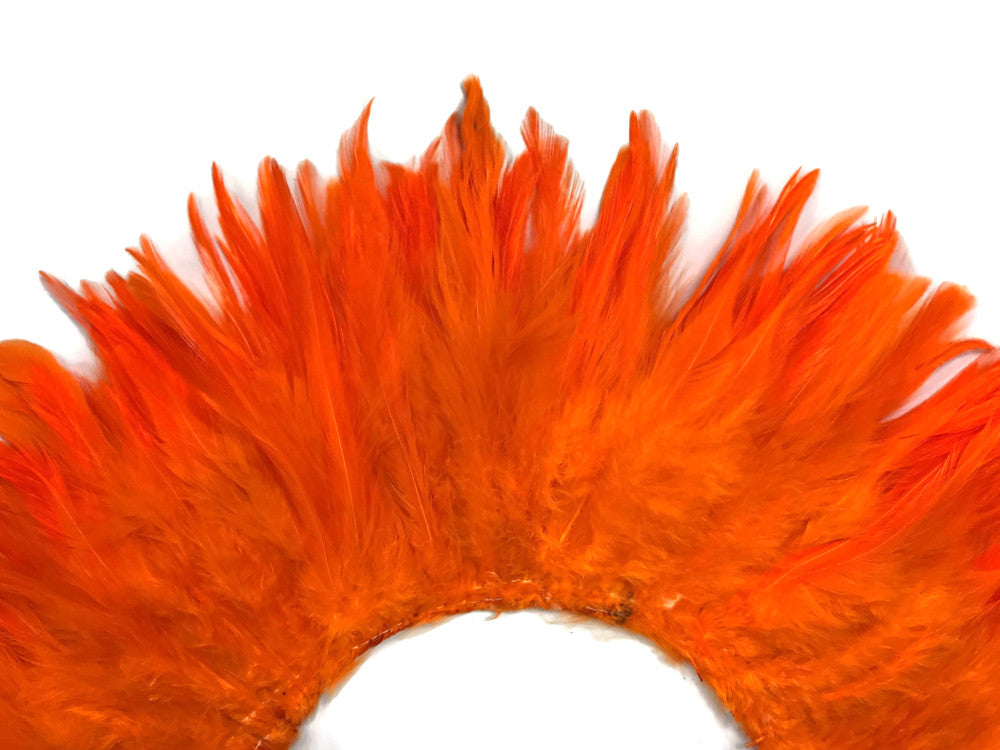 4 Inch Strip – 4-6” Dyed Orange Strung Chinese Rooster Saddle Feathers